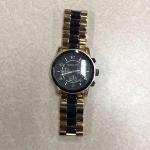 Michael Kors gold and black trim men’s watch